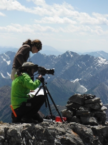 Vladka Lackova-Gat and Nicole Goodman (on the camera). Cairns, a pile of rocks to mark a route, were often used in survey methodology to mark a specific survey location