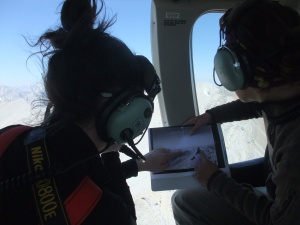 [Left to Right] Tanya Taggart-Hodge and Vladka Lackova flying with the door off; Vladka as the “Station whisperer” and Tanya as the Photographer 